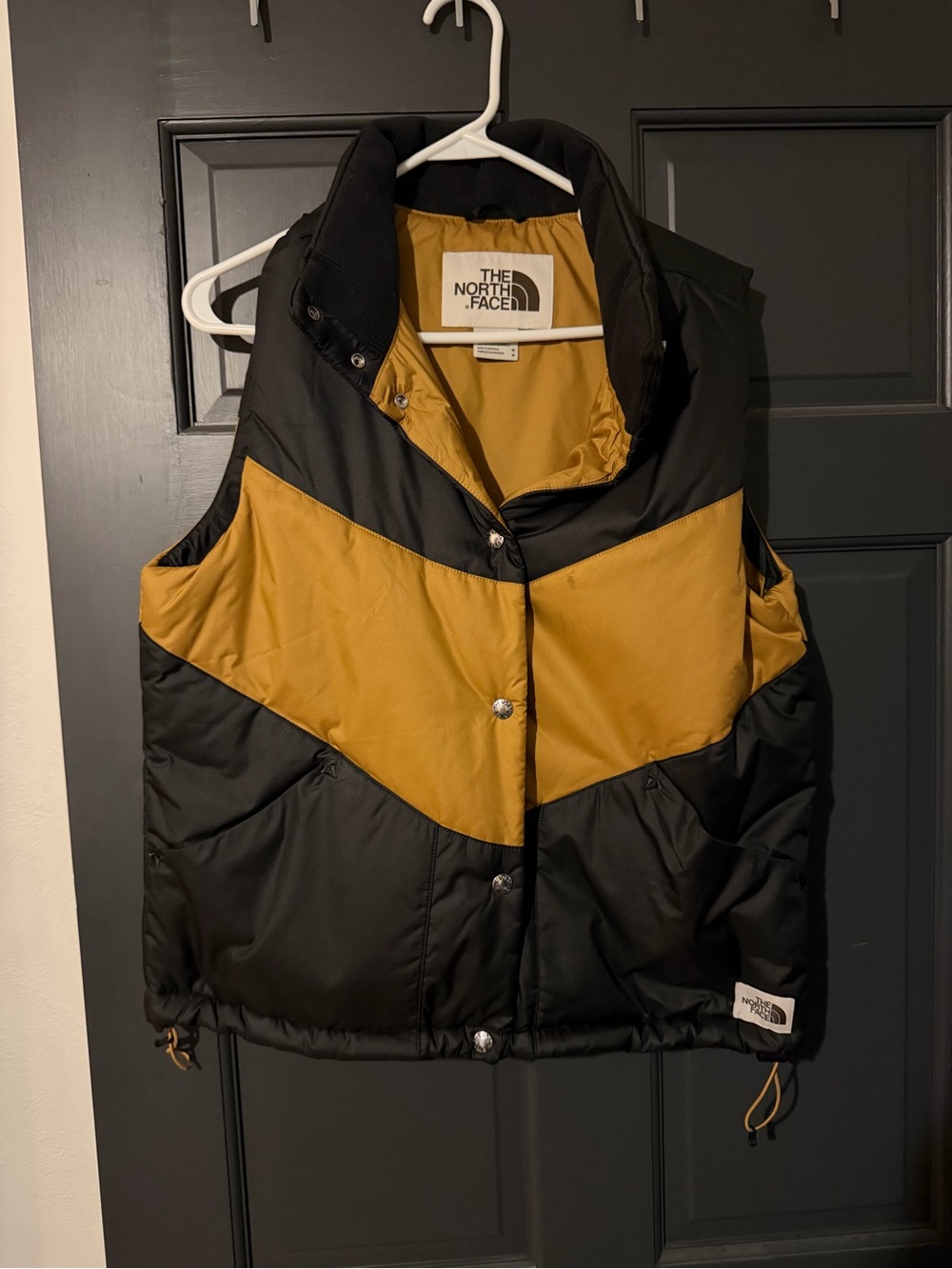 The North Face Black & Mustard Chevron Puffer Vest
